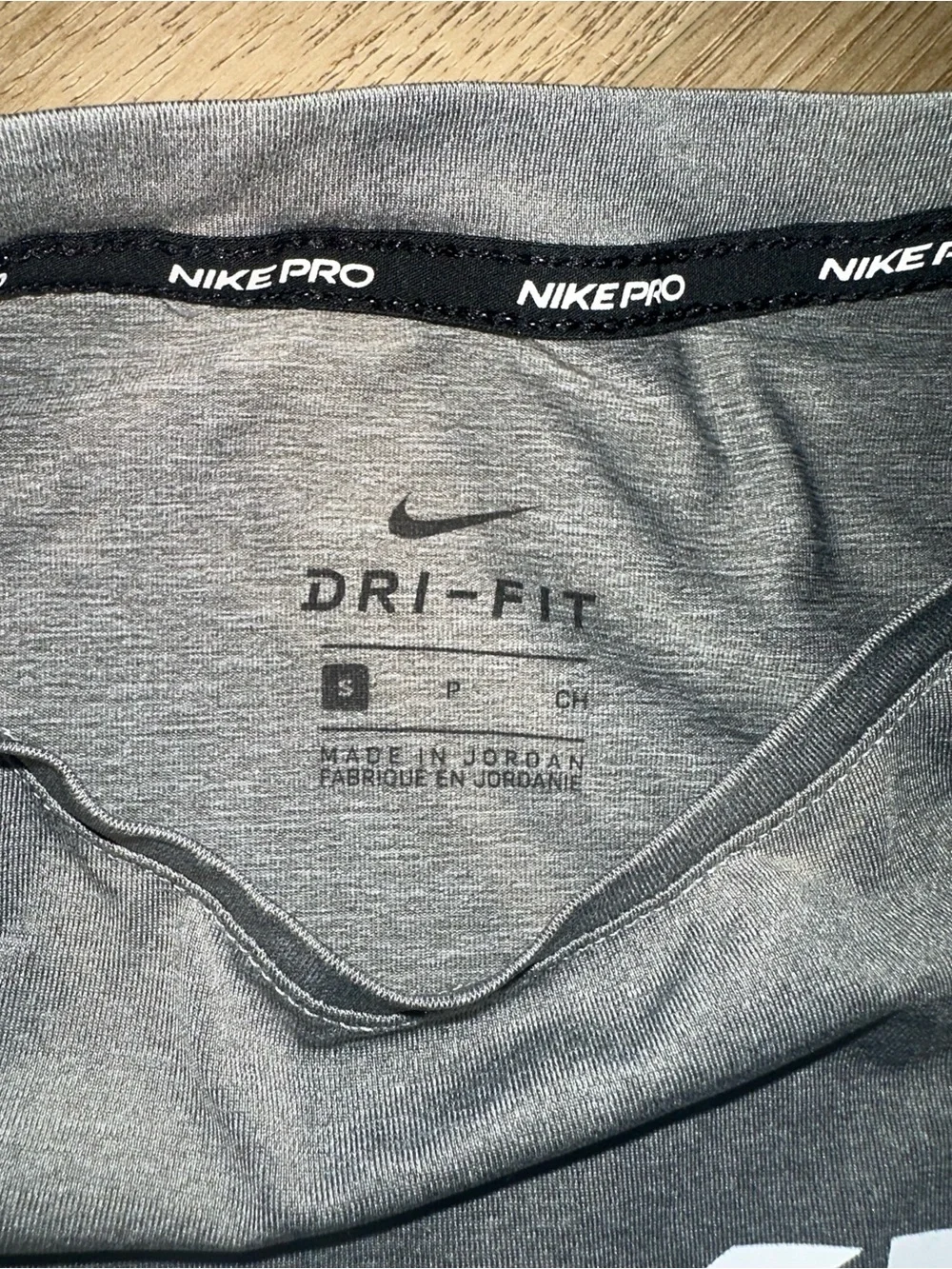 Nike Grey Sleeveless Dri-FIT Tank with White Logo